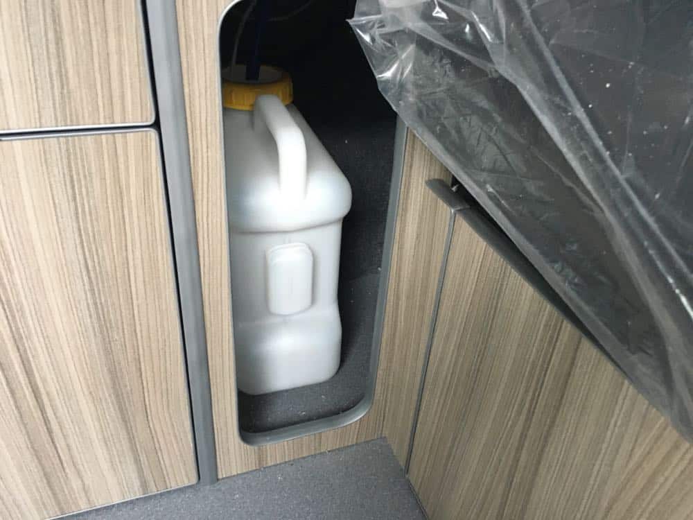 water bottle in narrow cupboard